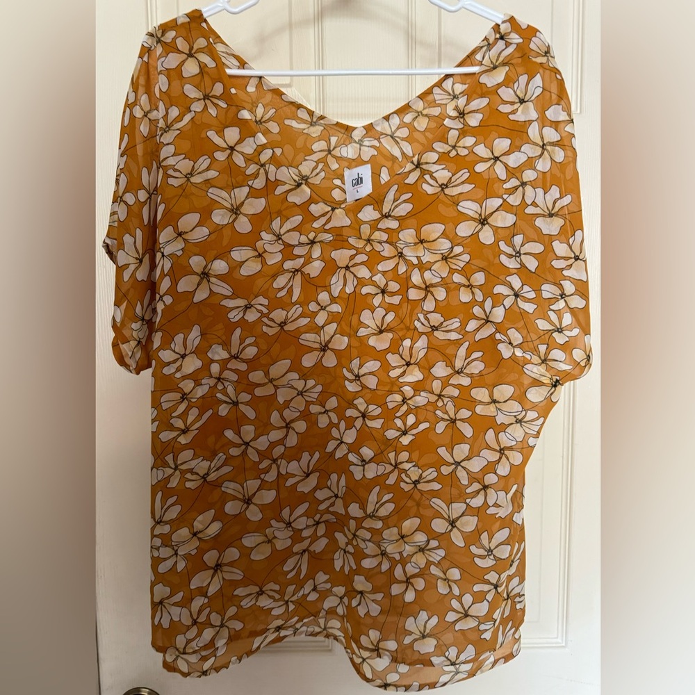 Women’s large cabi blouse.Lined. Flutter cap short sleeves.